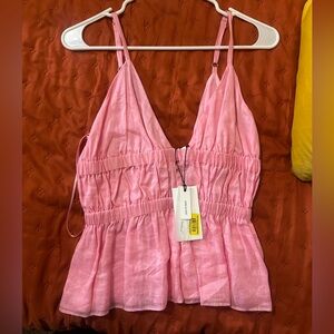 Dillard’s a loves a pink top